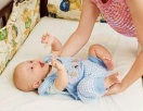 Готовим детские вещи к рождению малыша: глажка, хранение